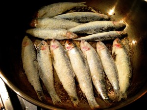 Sprats, dusted in coconut flour and buckwheat flour, tossed onto a thin bed of warm salt and fried for about 2-3 minutes each side.